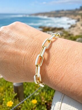 14k gold plated bracelet with white enamel accent and large lobster claw closure